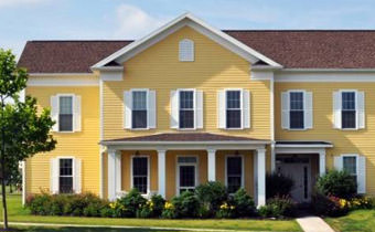 Yellow apartment building.