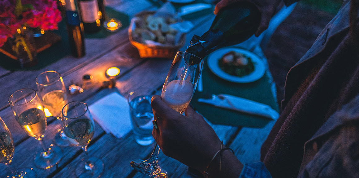 Woman holding a glass of champagne