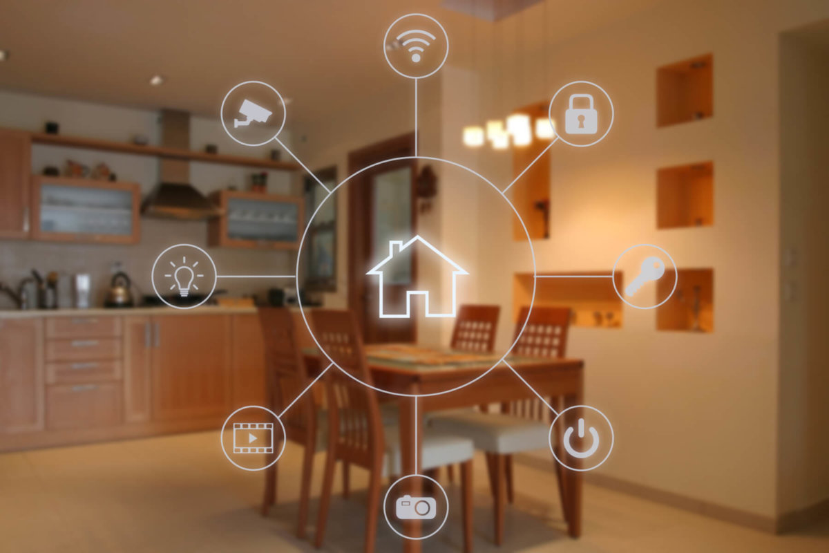 Graphic of technology symbols superimposed on photo of a kitchen