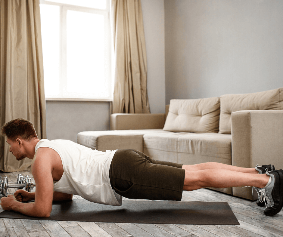 Man working out in living room