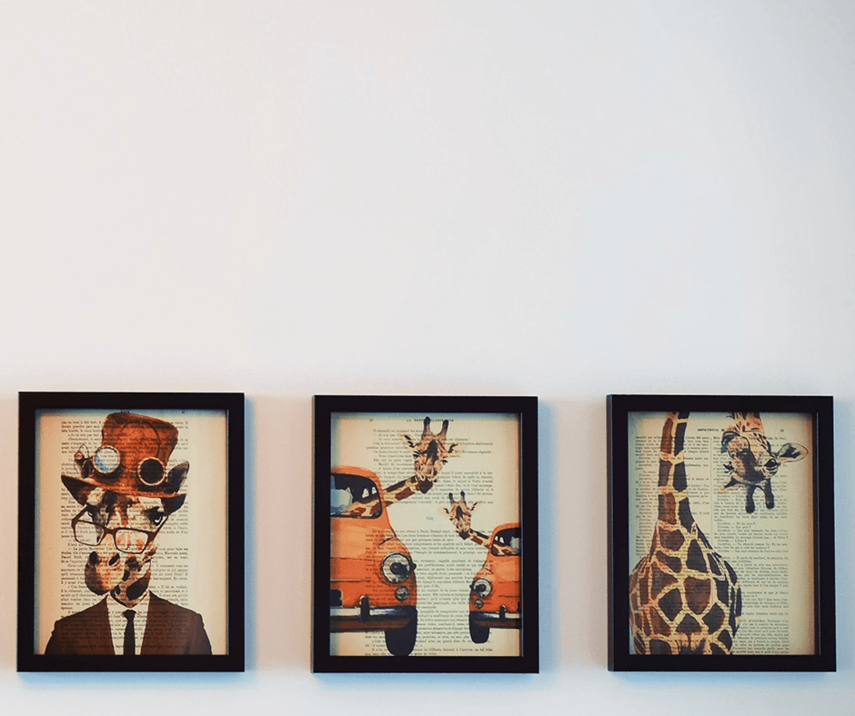 Three paintings hung together on a wall. Image credit Tim Gouw