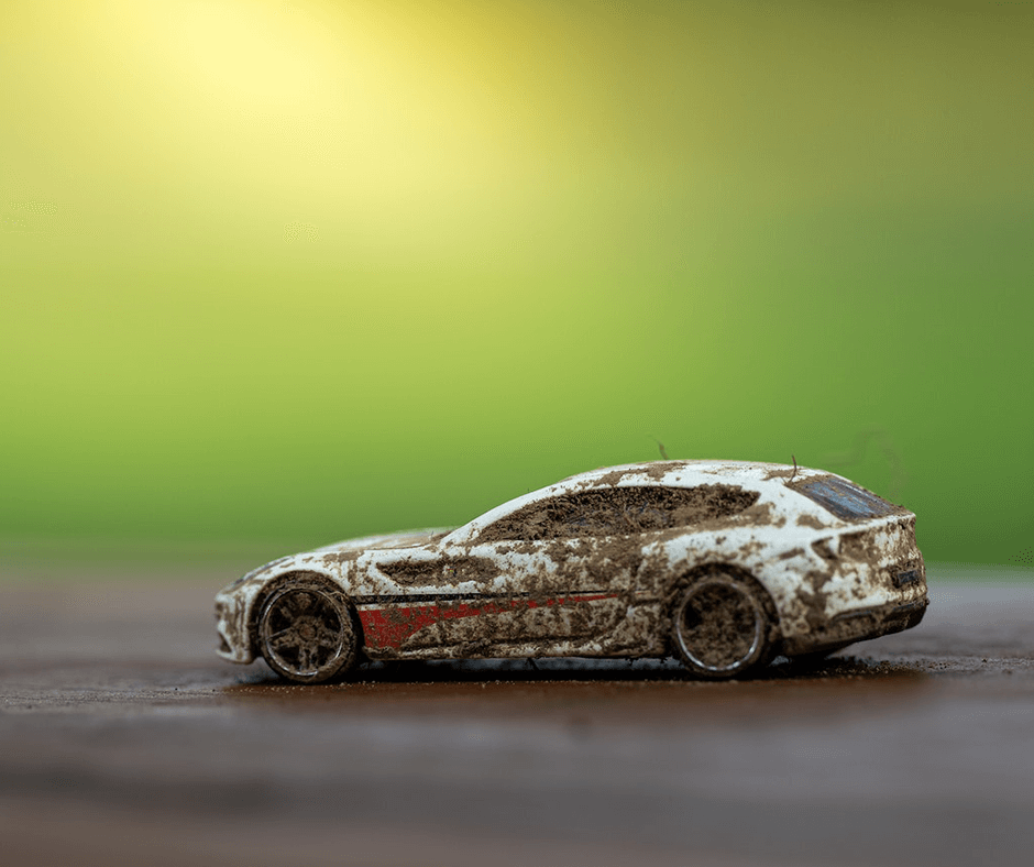 Toy car covered in mud. Image credit: Chris F