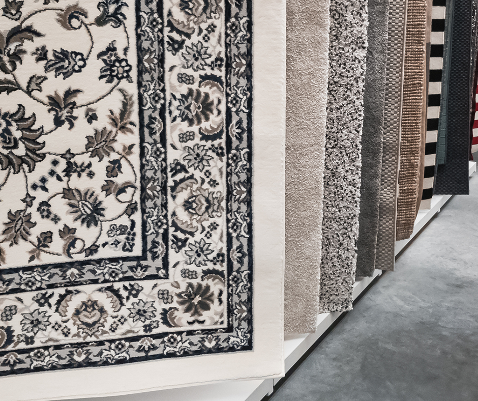 Area rugs in a store display. Image credit: iStock