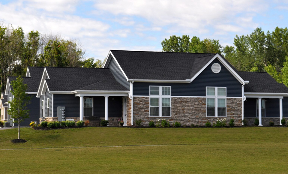 The villas feature 2 bedrooms, single-story living, and attached garages.